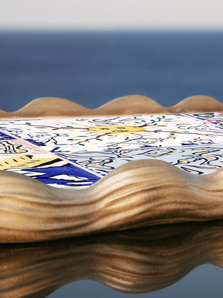Decorative home tray from the Dreaming of Cadaqués collection by Marlo Laz, featuring a colorful, artistic design on a wooden tray.