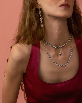 Model wearing georgian open collar and sunburst earrings