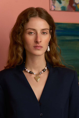 Model wearing tahitian pearl open necklace