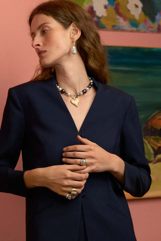 Model wearing cigar band rings