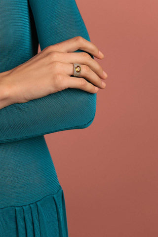 close-up of model wearing a ring