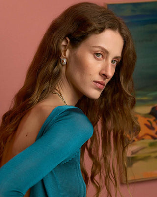 Model wearing earrings