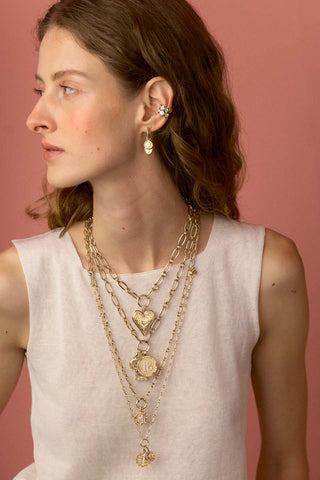 Model wearing numero coin