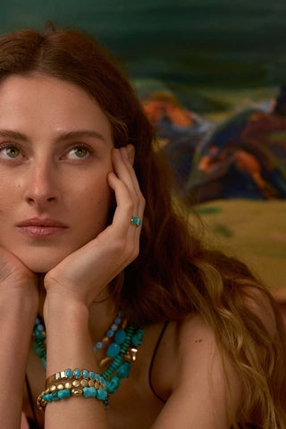 Model wearing turquoise jewelry 