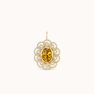 Gold pendant with a yellow citrine gemstone