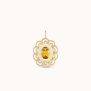 back of gold pendant with a yellow citrine gemstone