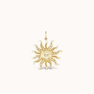 Back of gold sun pendant 
