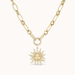 Gold necklace with a sun pendant