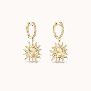 Gold sun-shaped earrings 