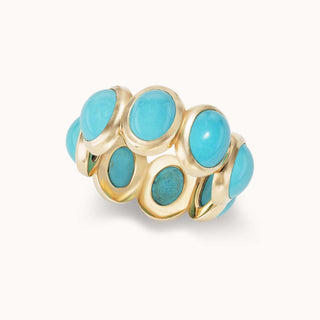 Gold ring with turquoise stones