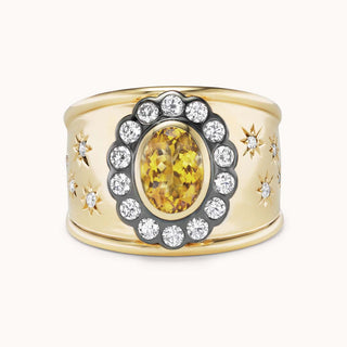 Gold cigar band ring with citrine and star designs