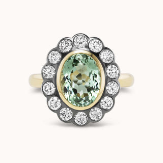 Ring with green tourmaline and diamond bezel