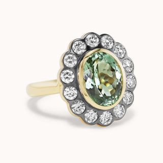 Ring with green tourmaline and diamond bezel