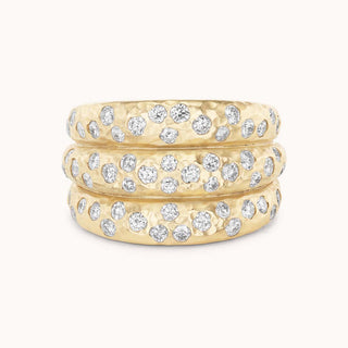 Three attached hammered stacking bands with pave diamonds