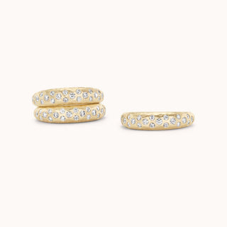 Stacked hammered gold rings with pave diamonds