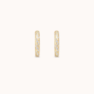 Gold hammered hoop earrings with pave diamonds