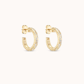 side view hammered hoop earrings with pave diamonds