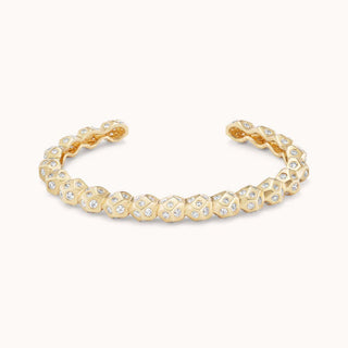 Gold hammered bracelet with pave diamonds 