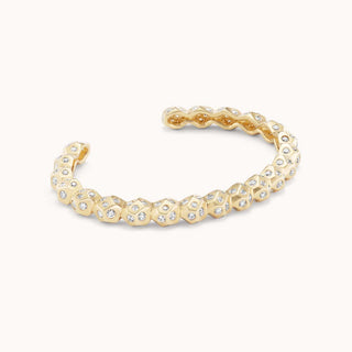 Gold hammered bracelet with pave diamonds 
